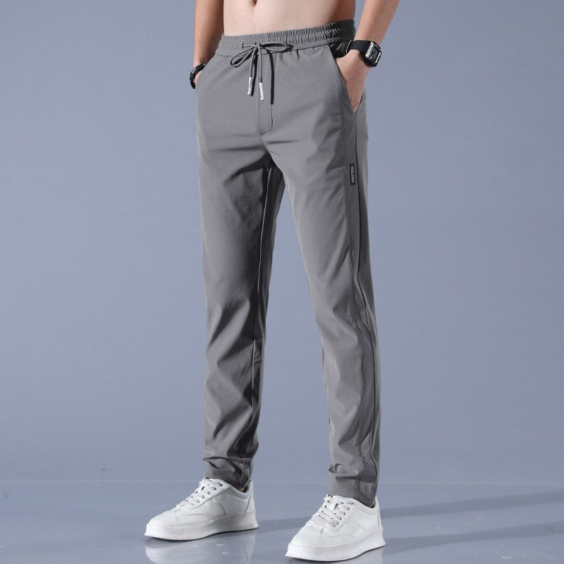 Regular-fit men's chinos, EliteFlex stretch fabric for all-day comfort & modern style.