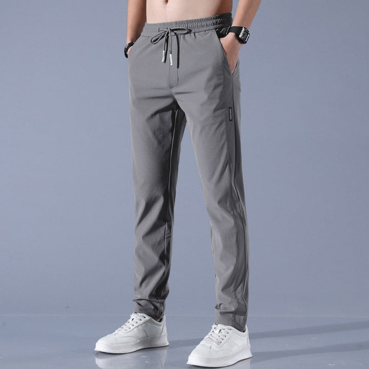 Regular-fit men's chinos, EliteFlex stretch fabric for all-day comfort & modern style.