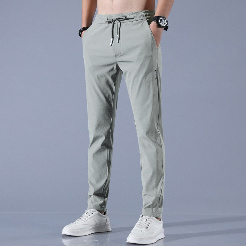 Smart men's EliteFlex chinos, a stylish regular-fit stretch trouser for comfort & versatile wear.