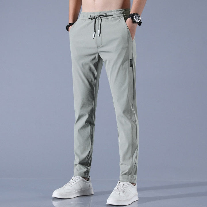 Smart men's EliteFlex chinos, a stylish regular-fit stretch trouser for comfort & versatile wear.