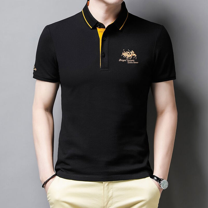 Detailed close-up of the elegant embroidery on a men's polo shirt, showcasing the unique design.