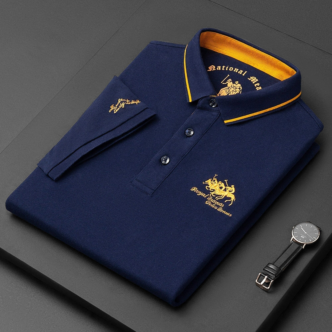 Young man wearing a casual men's embroidered cotton polo shirt, perfect for everyday style.