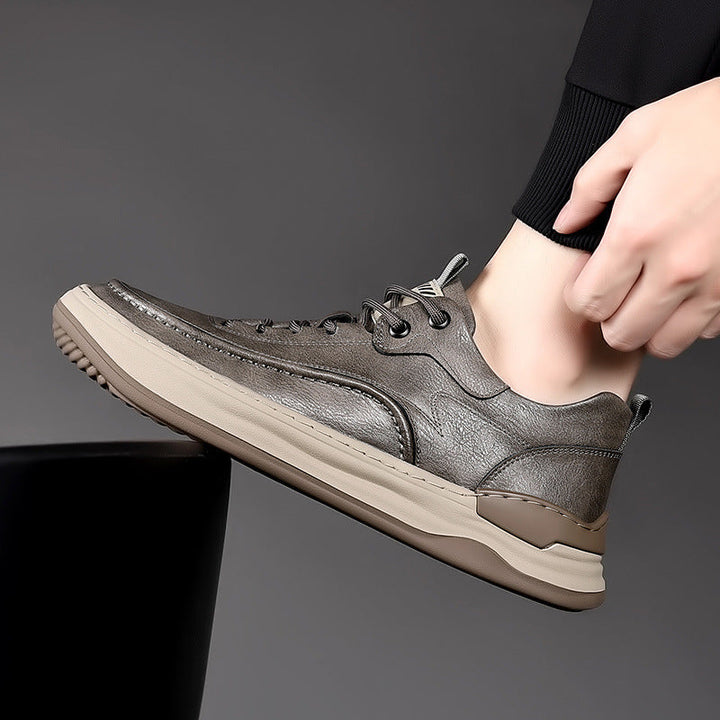 Gray lace-up men's everyday sneakers, combining style, durability & supreme walking comfort.