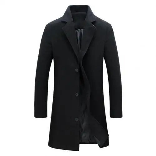 Man wearing an elegant long fall & winter coat, showcasing sophisticated smart casual style for men.