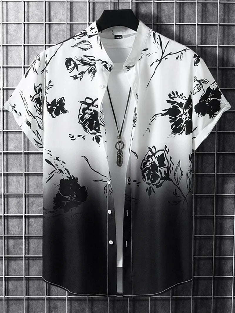 Patterned men's short-sleeve top with a floral print and stylish collar, perfect for summer casual fashion.