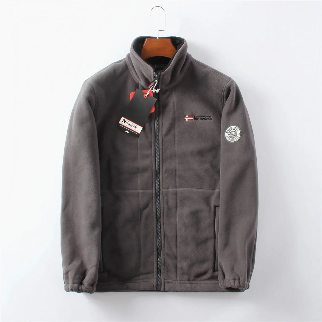 Fashionable men's black full-zip winter jacket, offering warmth and modern style.
