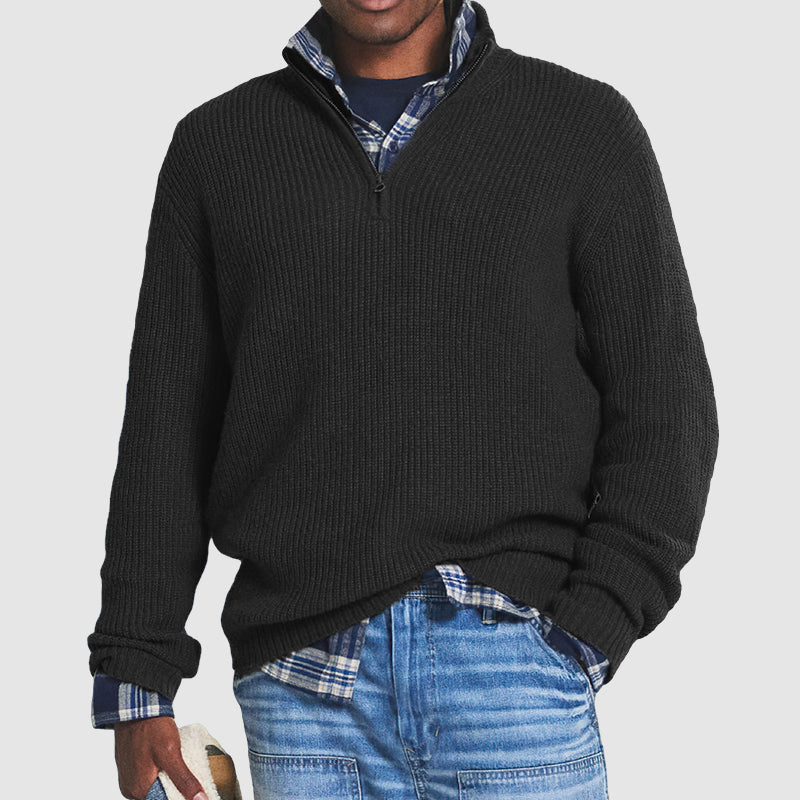 Detailed view of a men's half-zip sweater, emphasizing its modern style and comfortable, high-quality fabric.