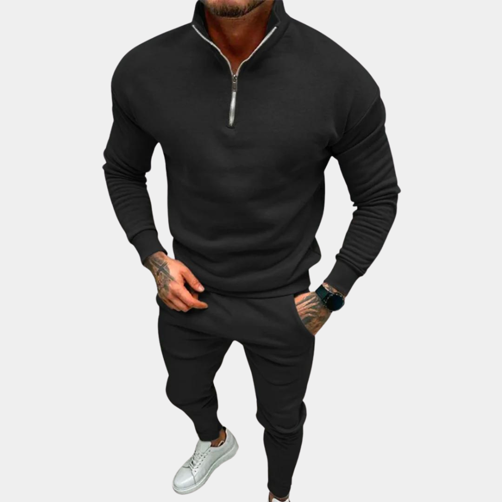 Men's stylish half-zip tracksuit set. Comfortable joggers & sweater, perfect for casual wear or activewear.