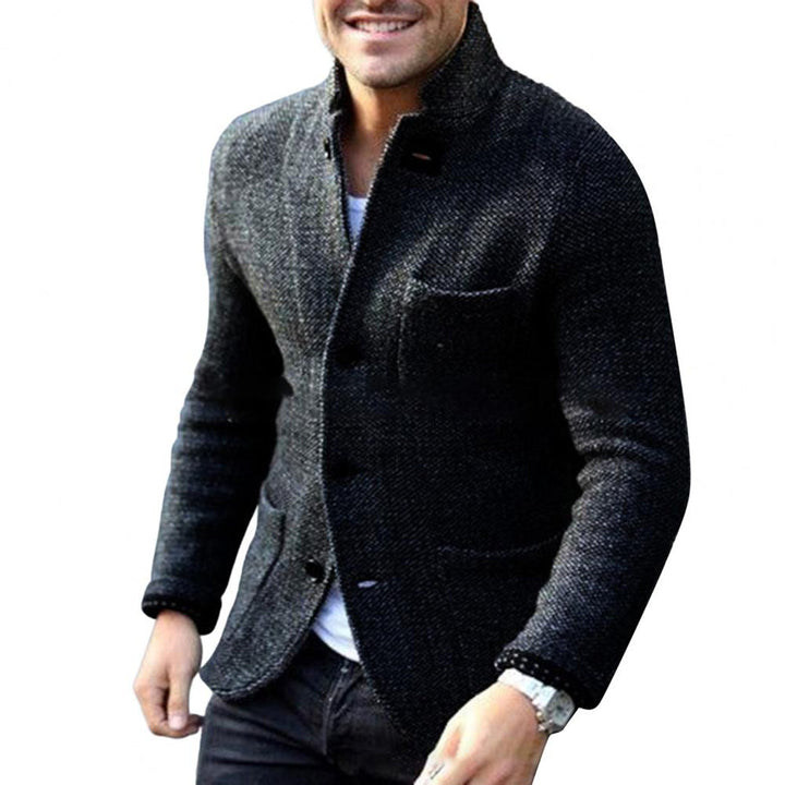 Cozy men's button-up cardigan sweater, offering comfort & versatility for casual or smart outfits.