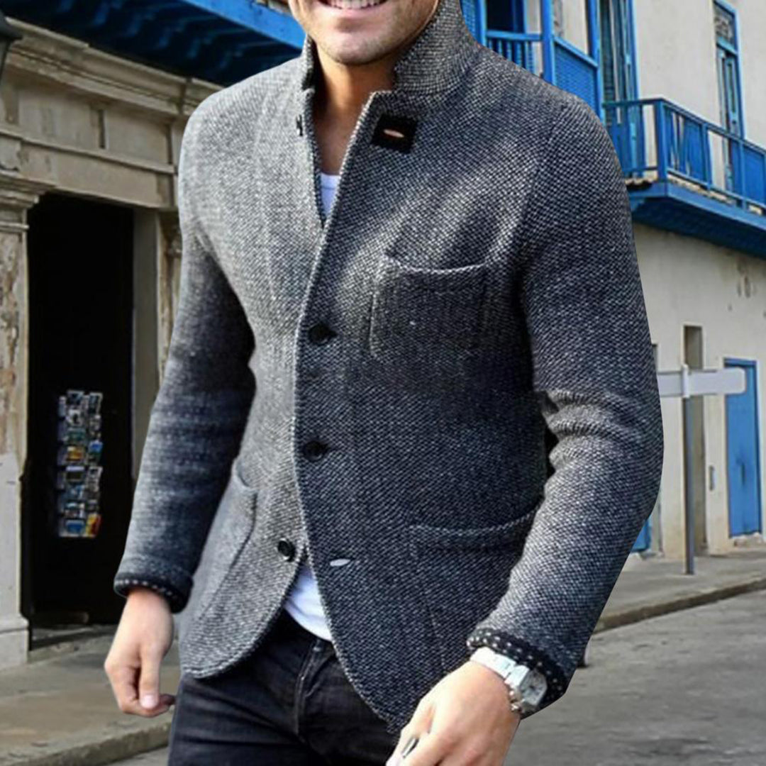 Textured men's knit cardigan with button closure, offering stylish comfort for everyday wear.