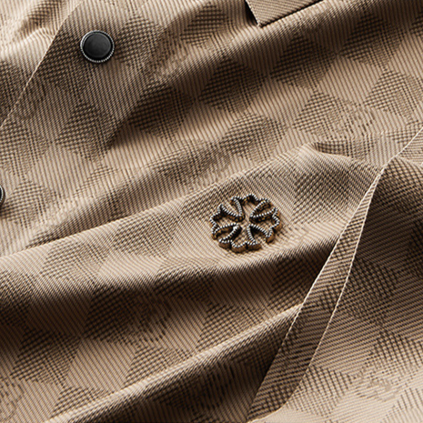 Comfortable men's apricot knit polo shirt with a stylish check design.