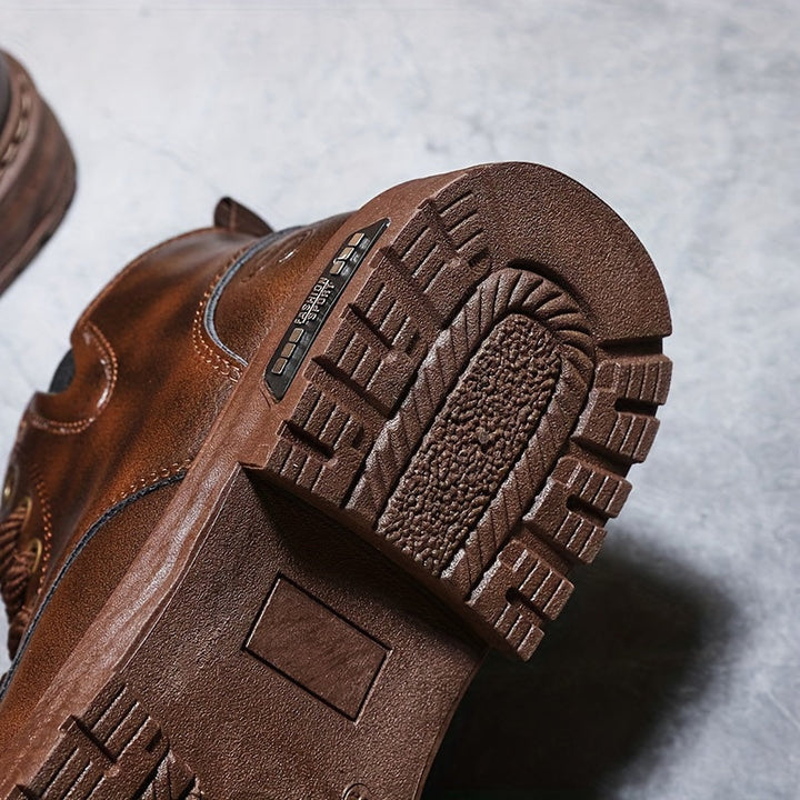 Detailed view of men's lace-up boots, highlighting the side zipper, robust sole, and quality craftsmanship.