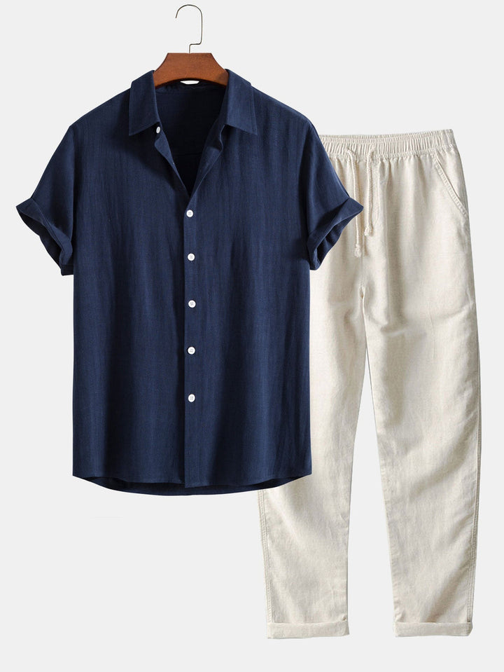 Men's short-sleeve linen shirt with stand-up collar & matching casual trousers set.