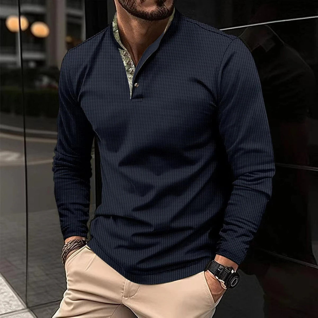 Men's Finn long sleeve polo shirt. Features a stylish colored collar & comfortable fabric for casual wear.