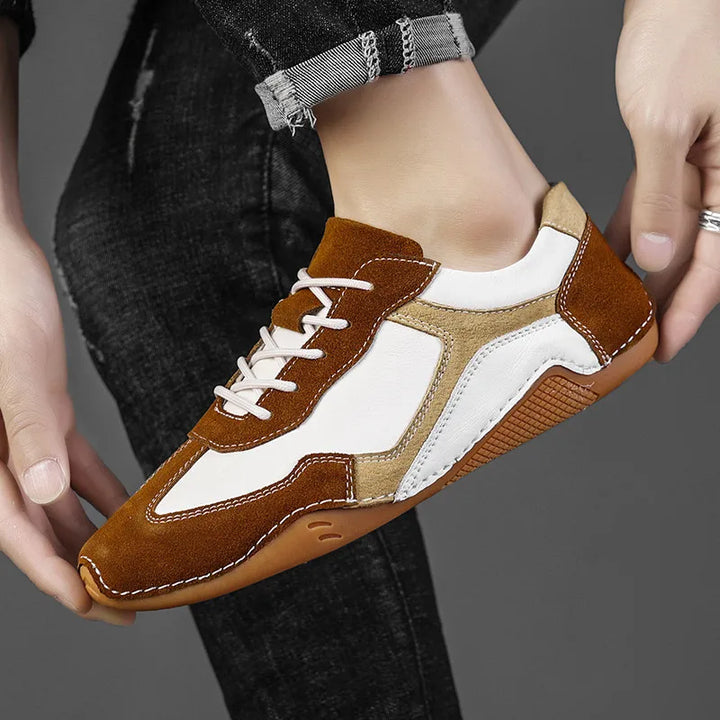 Stylish men's low-top sneakers with a contrasting gum sole, great for casual & everyday fashion.