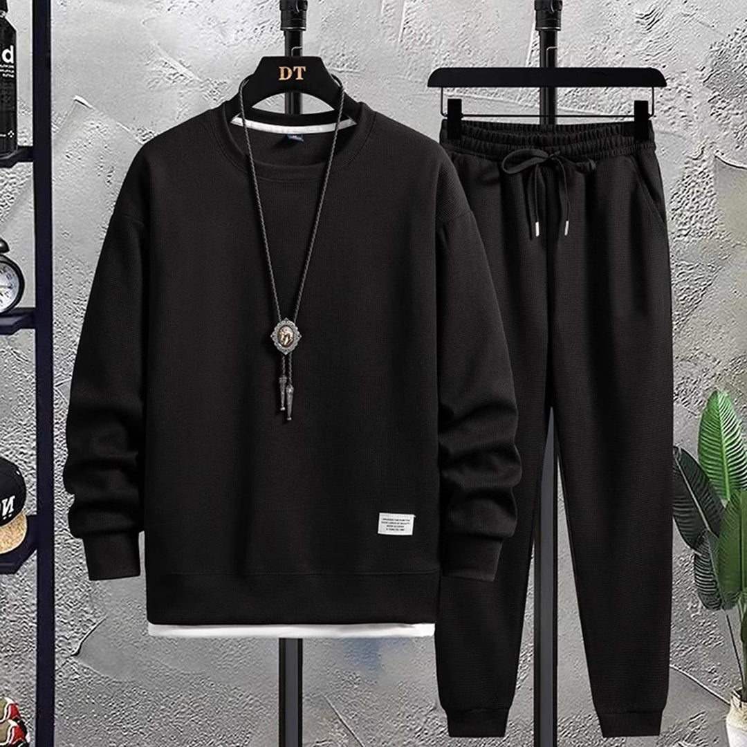 Versatile men's Mason tracksuit set. Stylish activewear and comfortable loungewear two-piece for modern men's fashion.