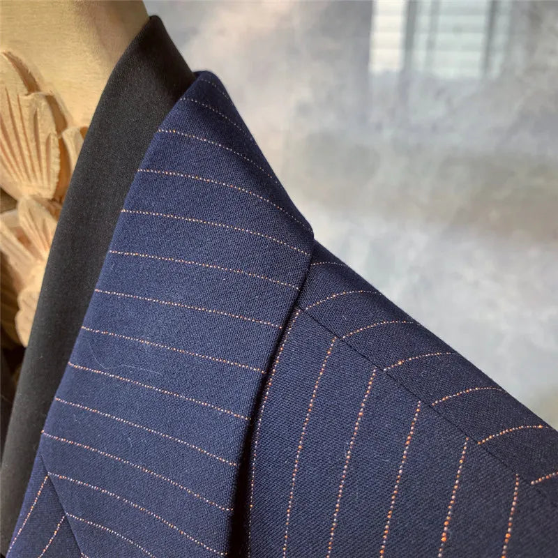 Classic men's navy blue pinstripe suit, perfect formal wear for business, events, and modern men's fashion.