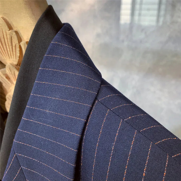 Classic men's navy blue pinstripe suit, perfect formal wear for business, events, and modern men's fashion.