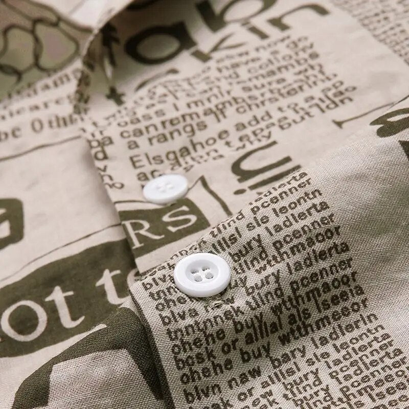 Back view of a men's short-sleeve newspaper print button-up shirt, highlighting its unique casual style.