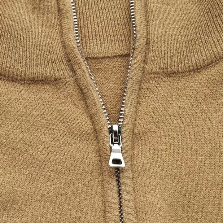 Fashionable men's half-zip sweater for everyday comfort, a versatile long sleeve pullover in neutral color.