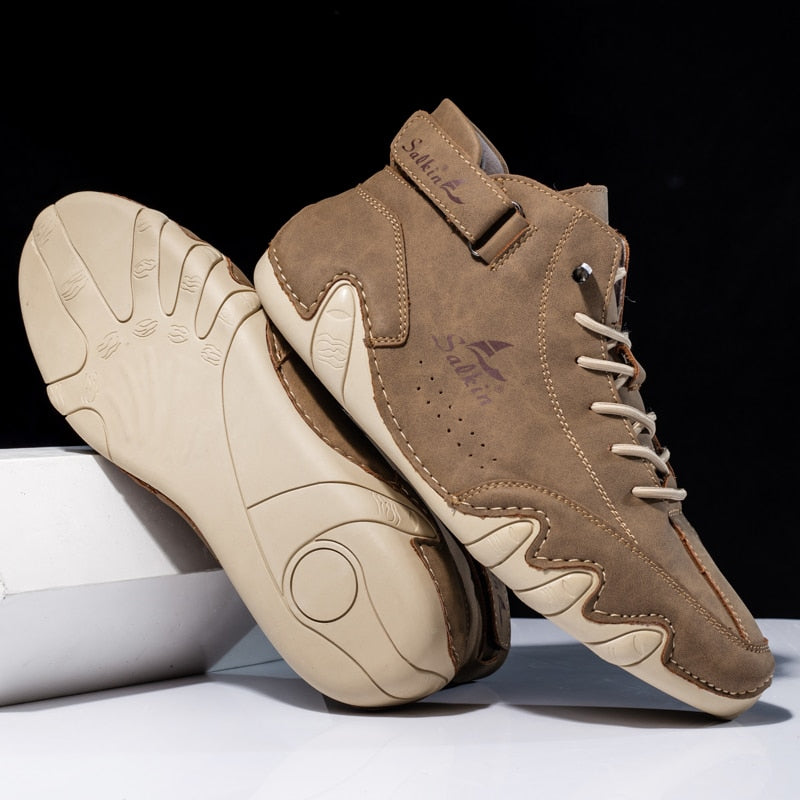 Close-up of men's orthopedic shoe sole, highlighting non-slip grip and supportive arch.