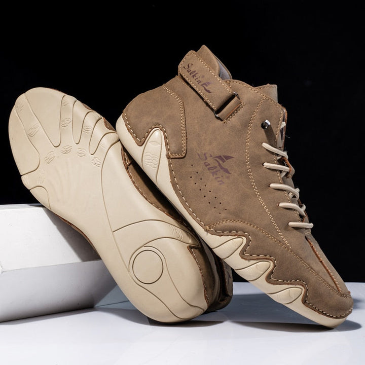 Close-up of men's orthopedic shoe sole, highlighting non-slip grip and supportive arch.