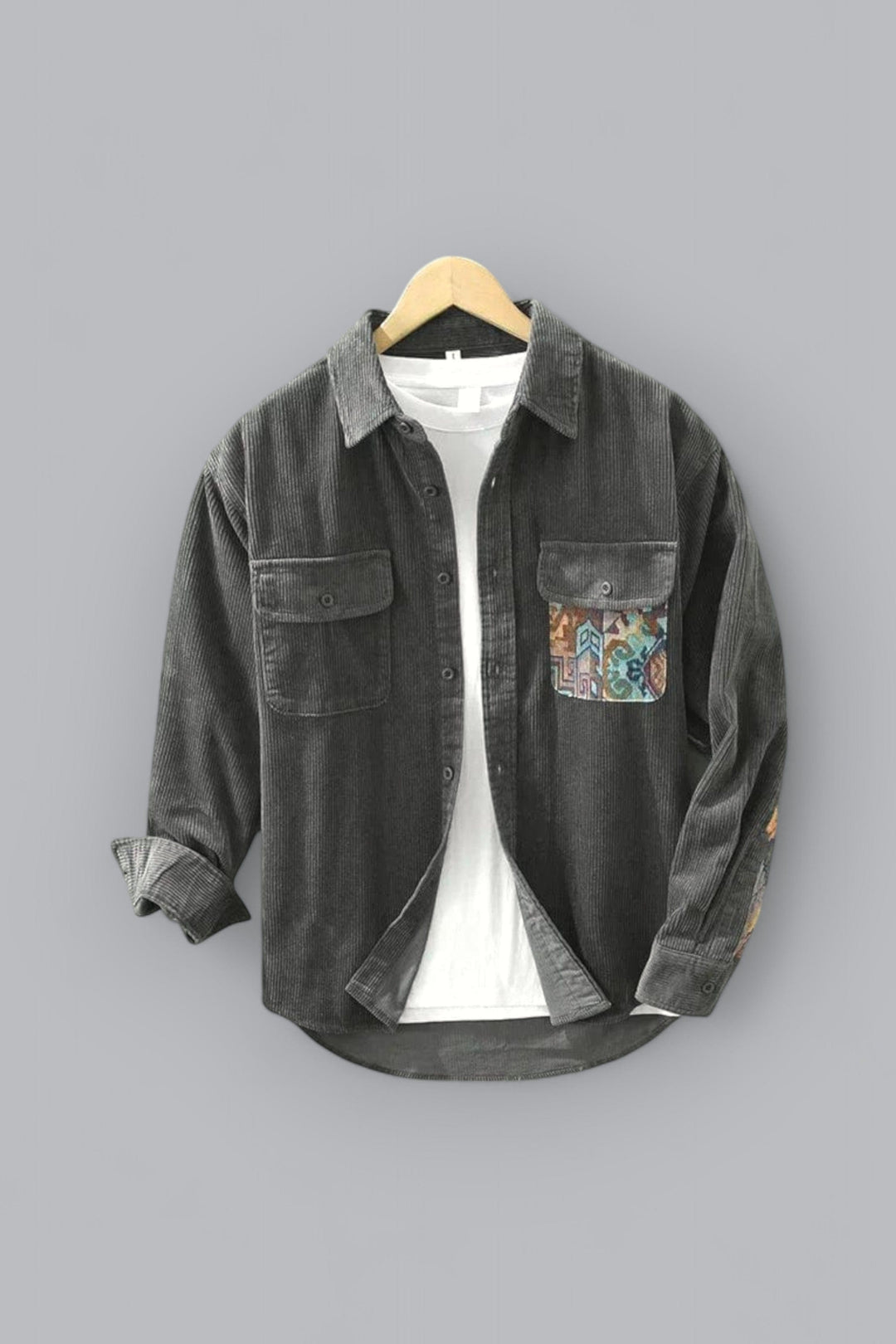 Men's stylish patchwork long sleeve shirt with unique design, featuring two chest pockets. Casual cotton top.