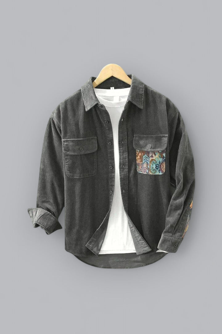 Men's stylish patchwork long sleeve shirt with unique design, featuring two chest pockets. Casual cotton top.