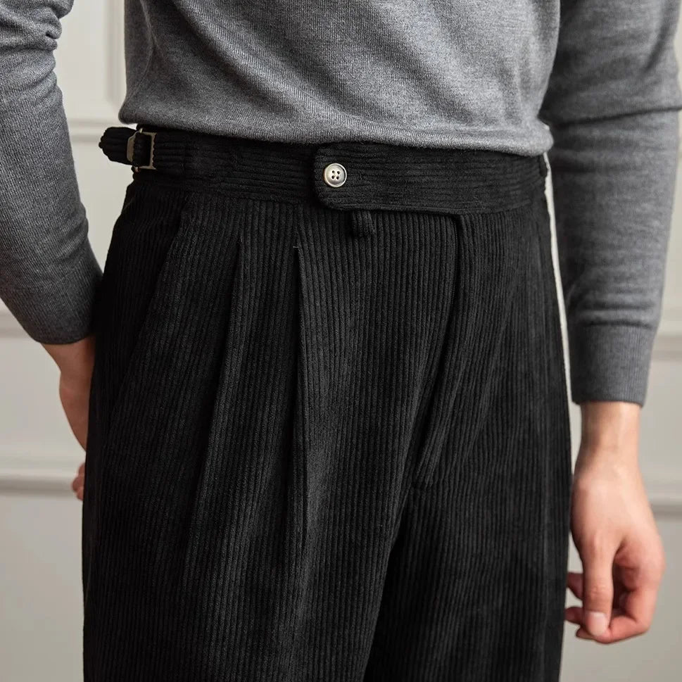 Modern men's pleated trousers with a tailored fit, versatile for smart casual autumn & winter fashion.