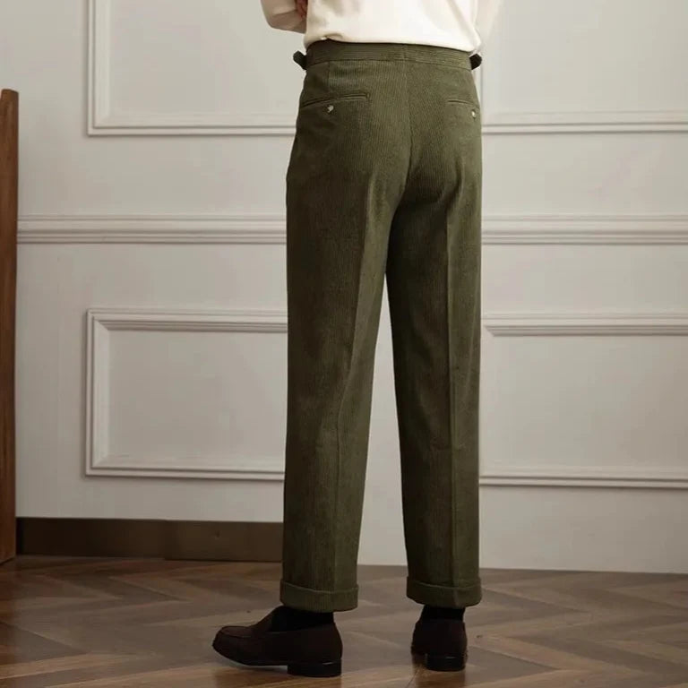 Classic men's pleated trousers, tailored fit with an adjustable waist for smart casual winter fashion.