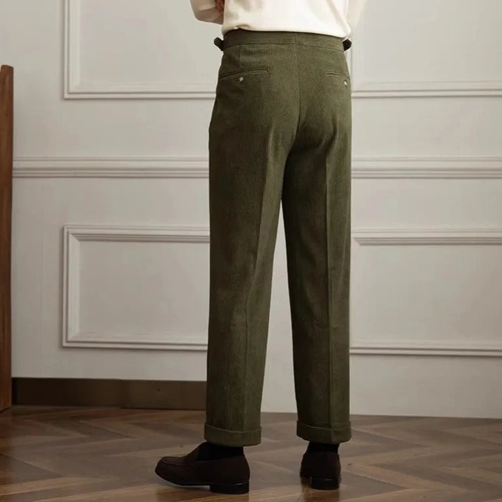 Classic men's pleated trousers, tailored fit with an adjustable waist for smart casual winter fashion.