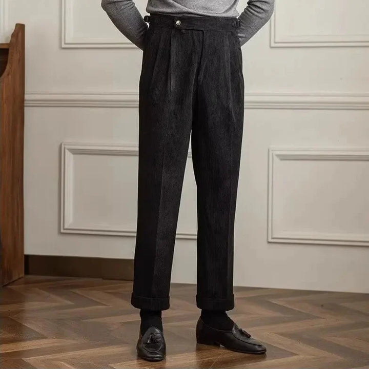 Elegant men's tailored fit pleated trousers, a stylish choice for smart casual and vintage-inspired outfits.