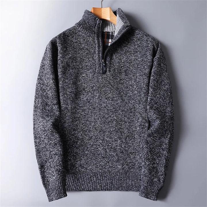Pullover men's quarter-zip turtleneck in textured knit, essential for warm & stylish layering.