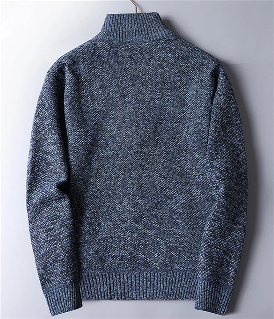 Modern men's quarter-zip turtleneck pullover with textured knit, perfect for fall fashion layering.