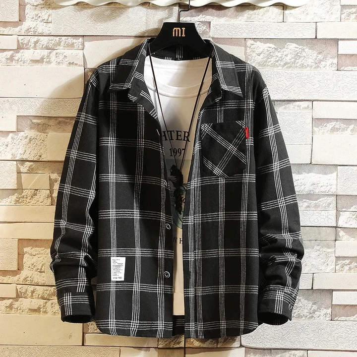 Comfortable men's long sleeve plaid flannel button-up shirt, ideal for everyday wear and casual outfits.
