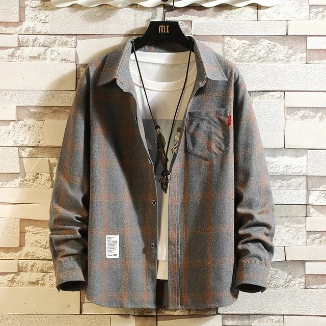 Stylish men's button-up flannel shirt in a versatile plaid pattern, great for casual comfort and everyday fashion.
