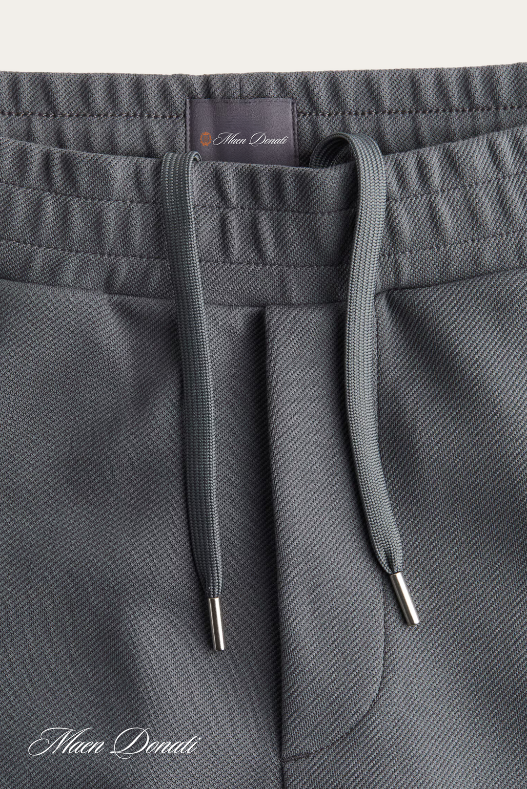 Sustainable men's relaxed-fit pants, stylish and comfortable for any occasion.