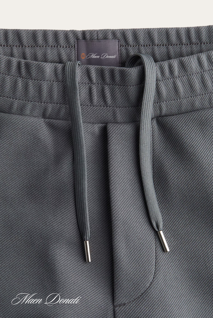 Sustainable men's relaxed-fit pants, stylish and comfortable for any occasion.