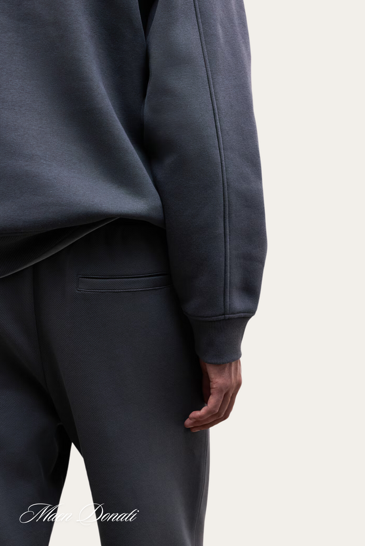 Stylish men's work pants, relaxed fit, made with recycled, comfortable fabric.