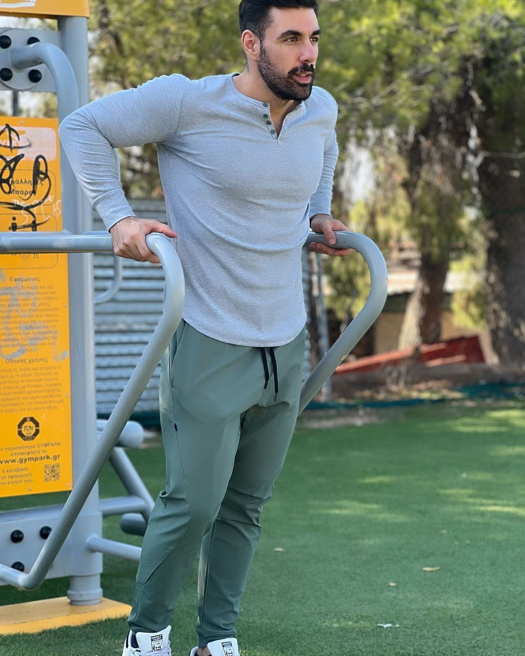 Long sleeve men's henley with ribbed texture, offering stylish comfort for any casual event.
