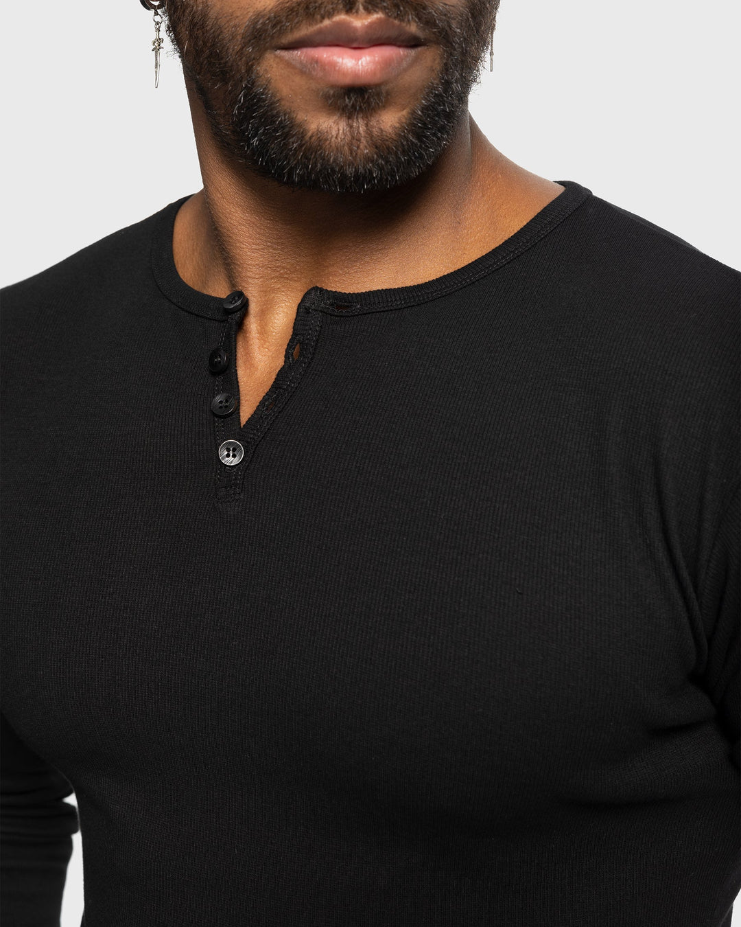 Durable men's ribbed henley, offering long sleeve comfort and stylish versatility for daily use.