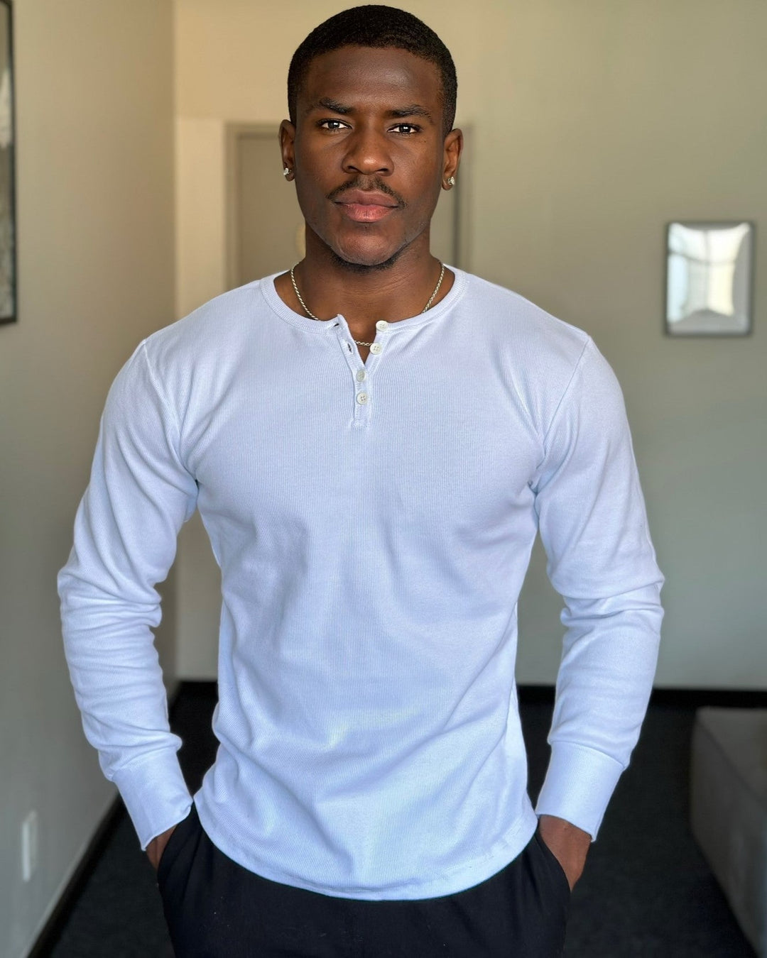 Men's versatile ribbed henley, a stylish long sleeve shirt offering comfortable fit for any occasion.