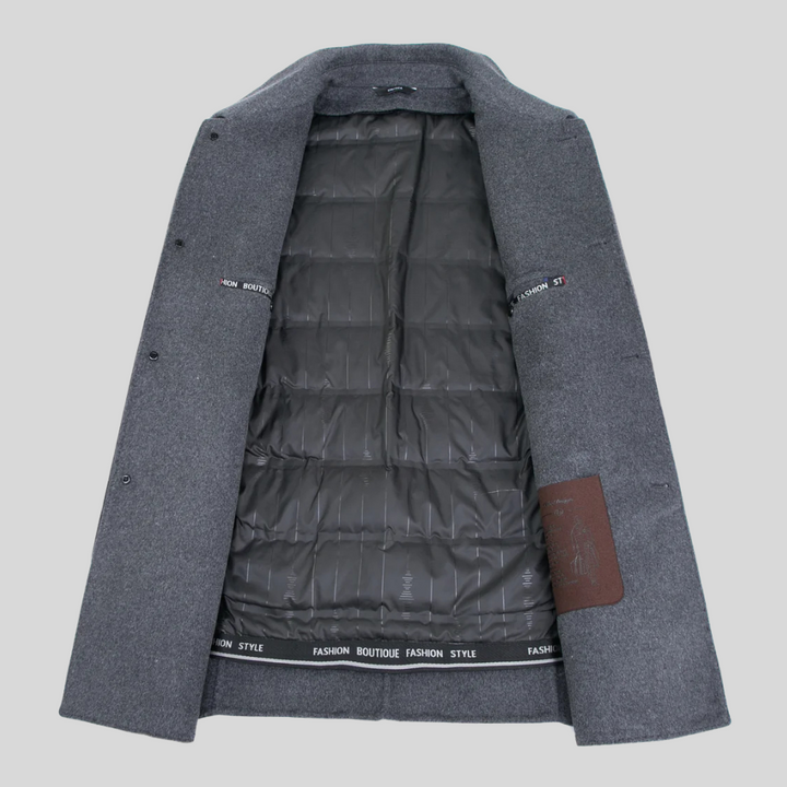 Sharp men's single-breasted overcoat. Tailored long winter jacket, perfect for professional and stylish cold-weather looks.