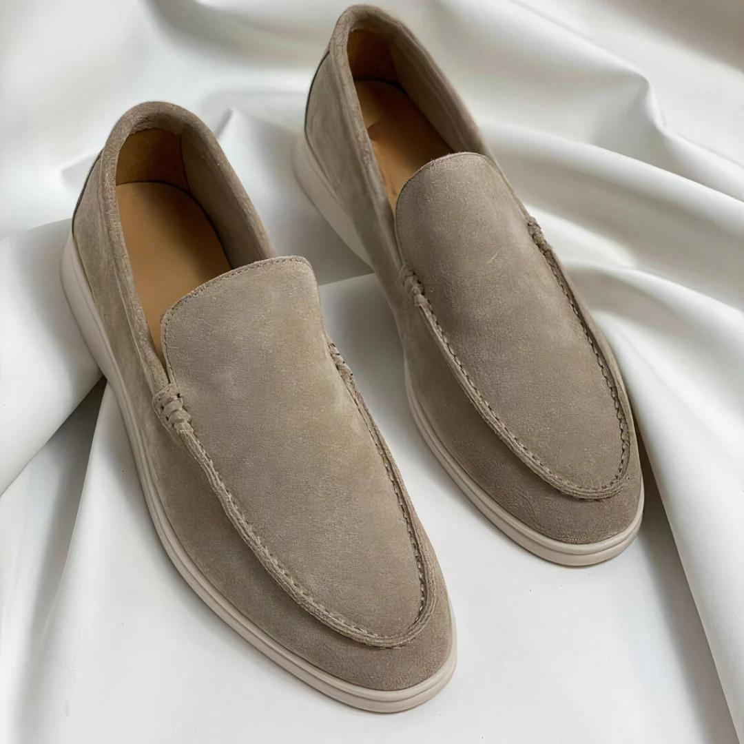 Fashionable men's slip-on loafers, combining comfort with a sleek design. Versatile footwear for dressy or casual looks.