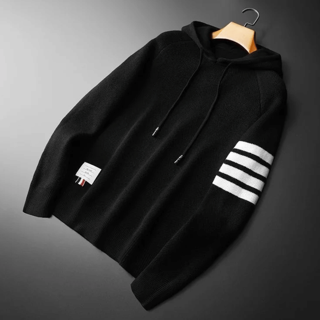 Stylish men's striped pullover hoodie embodying modern street style, offering comfort for an elevated casual appearance.