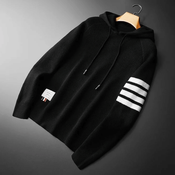 Stylish men's striped pullover hoodie embodying modern street style, offering comfort for an elevated casual appearance.
