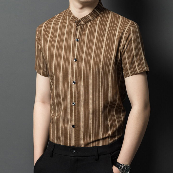 Folded men's stylish striped summer shirt, a comfortable and fashionable choice for summer outfits.