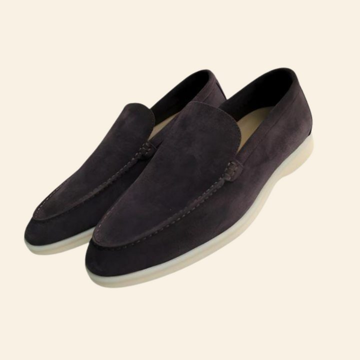 Fashionable men's suede loafers. Easy slip-on style provides comfort & versatility for modern men's outfits.