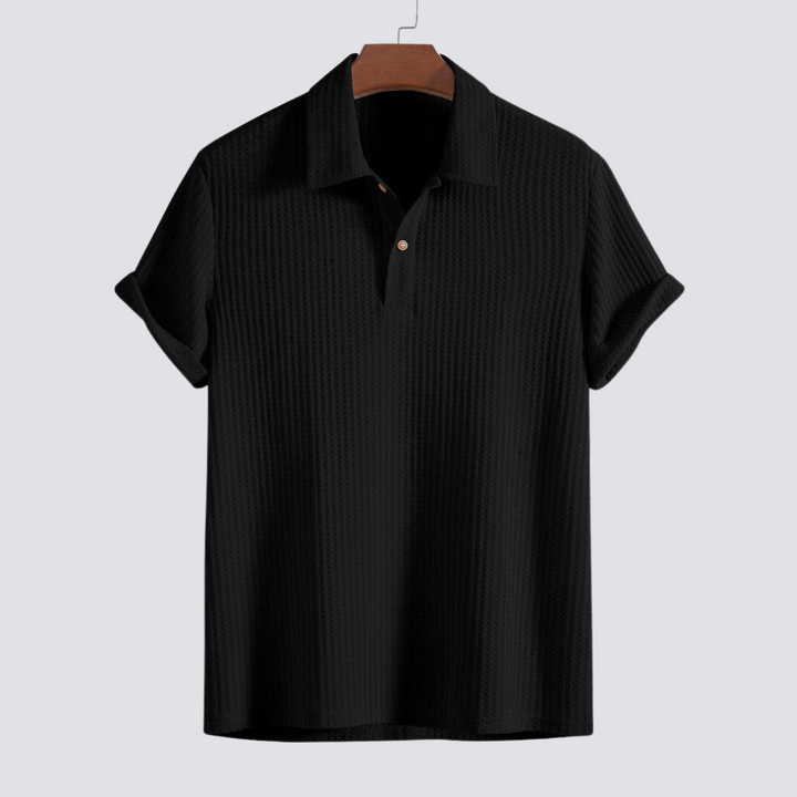 Comfortable men's textured polo shirt. Versatile short-sleeve top for casual spring/summer style.