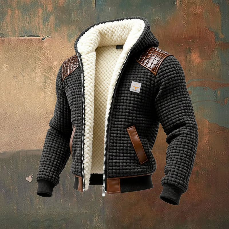 Close-up of men's textured winter jacket showcasing its rugged fabric, warmth, and modern design.